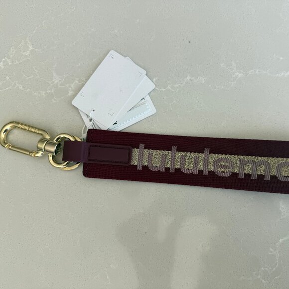 Lululemon Never Lost Keychain Burgundy and Gold - Picture 2 of 5